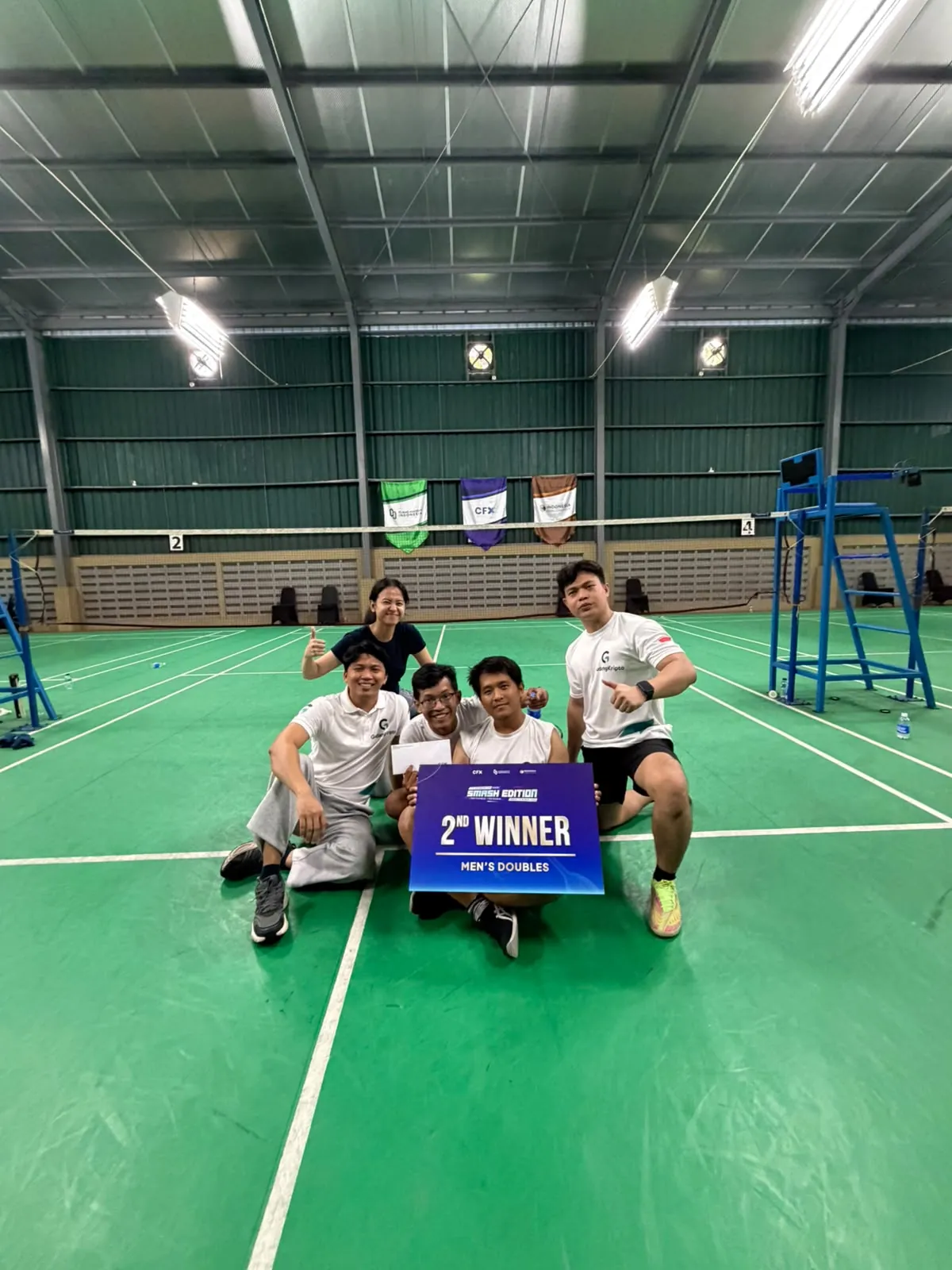 Amos dan tim Gudang Kripto memegang papan 2nd Winner Men's Doubles di CFX Members Cup 2026 Smash Edition